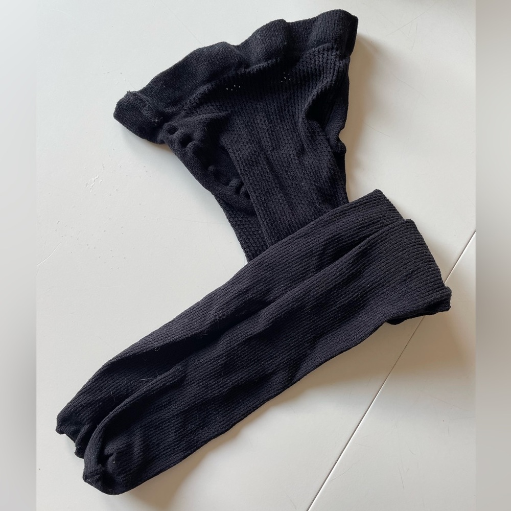 Wolford Black fishnet tights. Size S